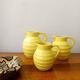 3 Orchies art deco pitchers in yellow ceramic