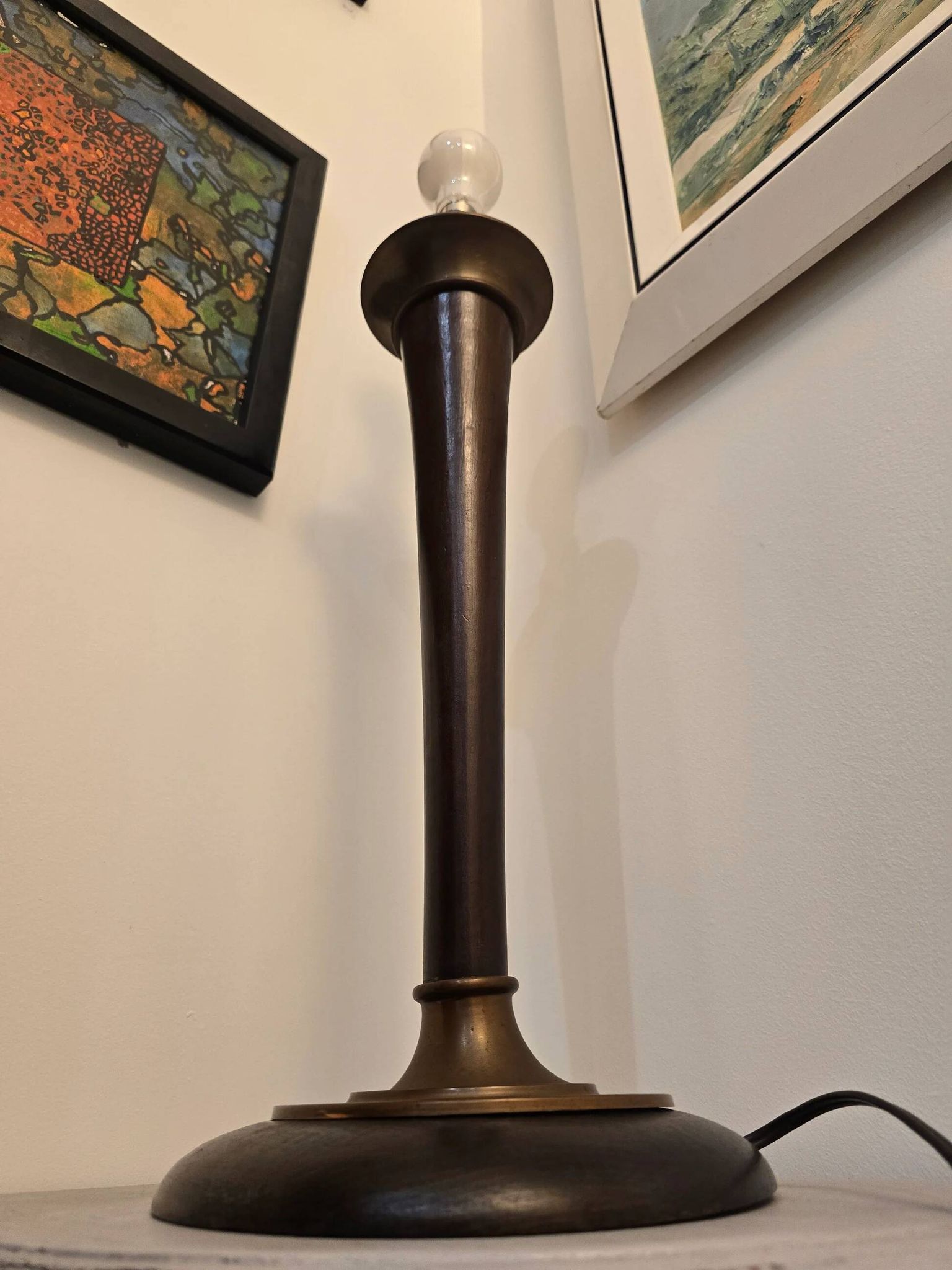 Vintage lamp base in Scandinavian style made of dark wood and bronze metal.