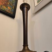 Vintage lamp base in Scandinavian style made of dark wood and bronze metal.