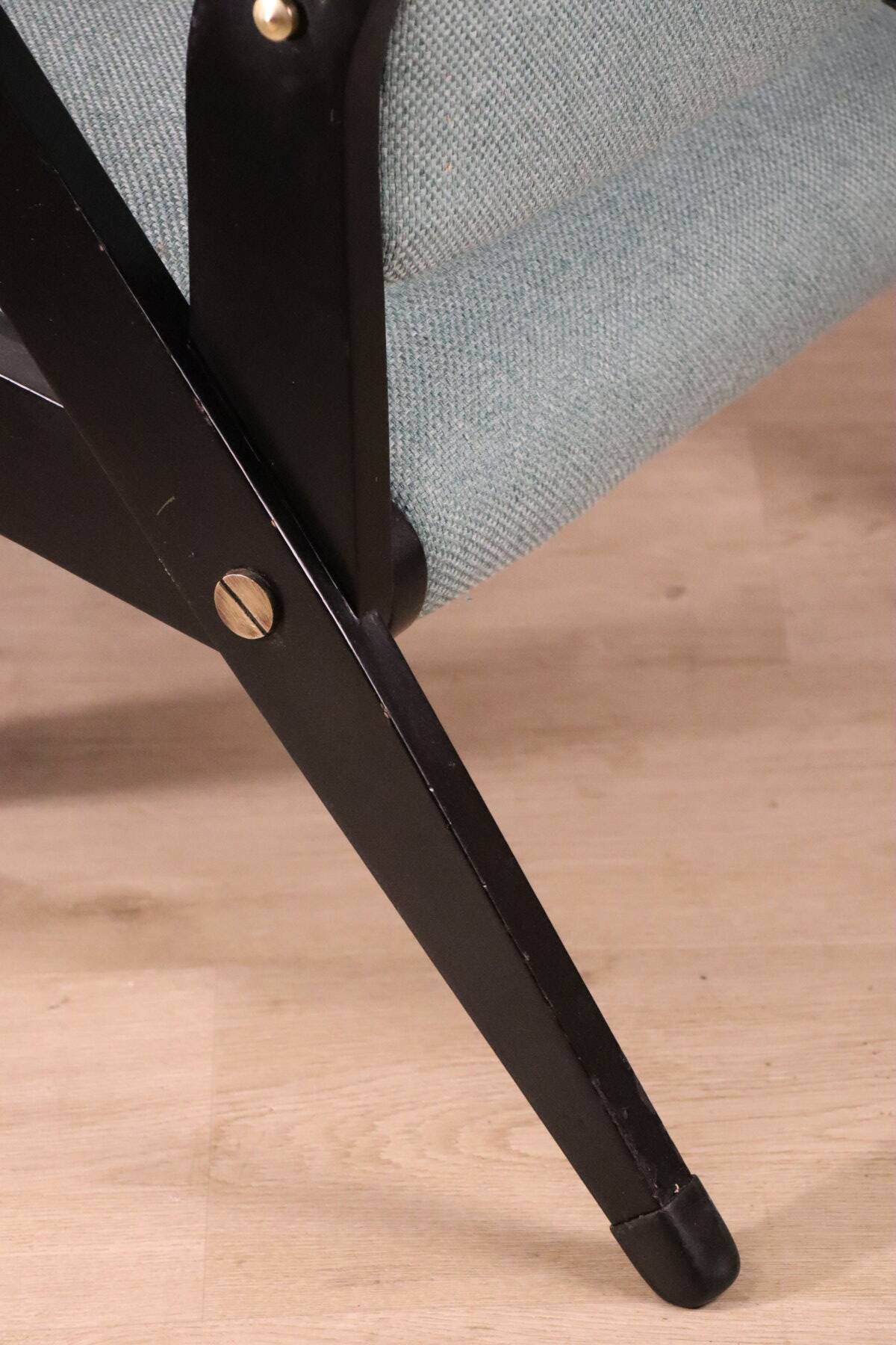 Vintage armchair from the 1960s in black wood and fabric.