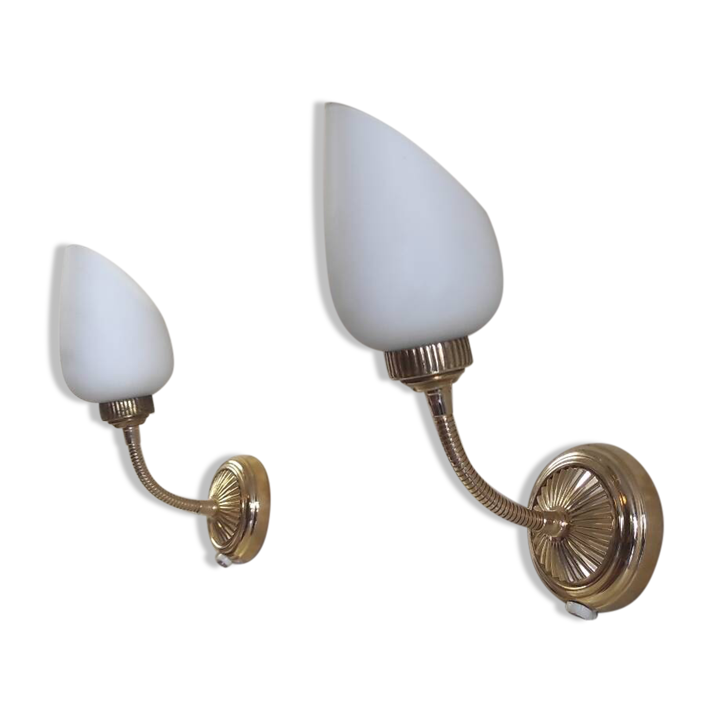 Articulated brass and opaline wall lights - mid 20th century.