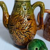 Set of old teapots and honey pot