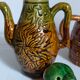 Set of old teapots and honey pot