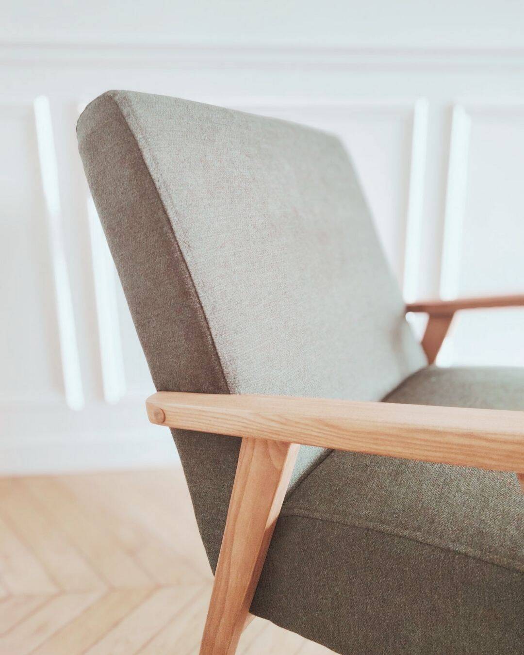 Renovated armchair, Scandinavian style in wood and green fabric.