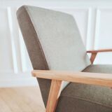 Renovated armchair, Scandinavian style in wood and green fabric.