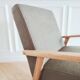 Renovated armchair, Scandinavian style in wood and green fabric.