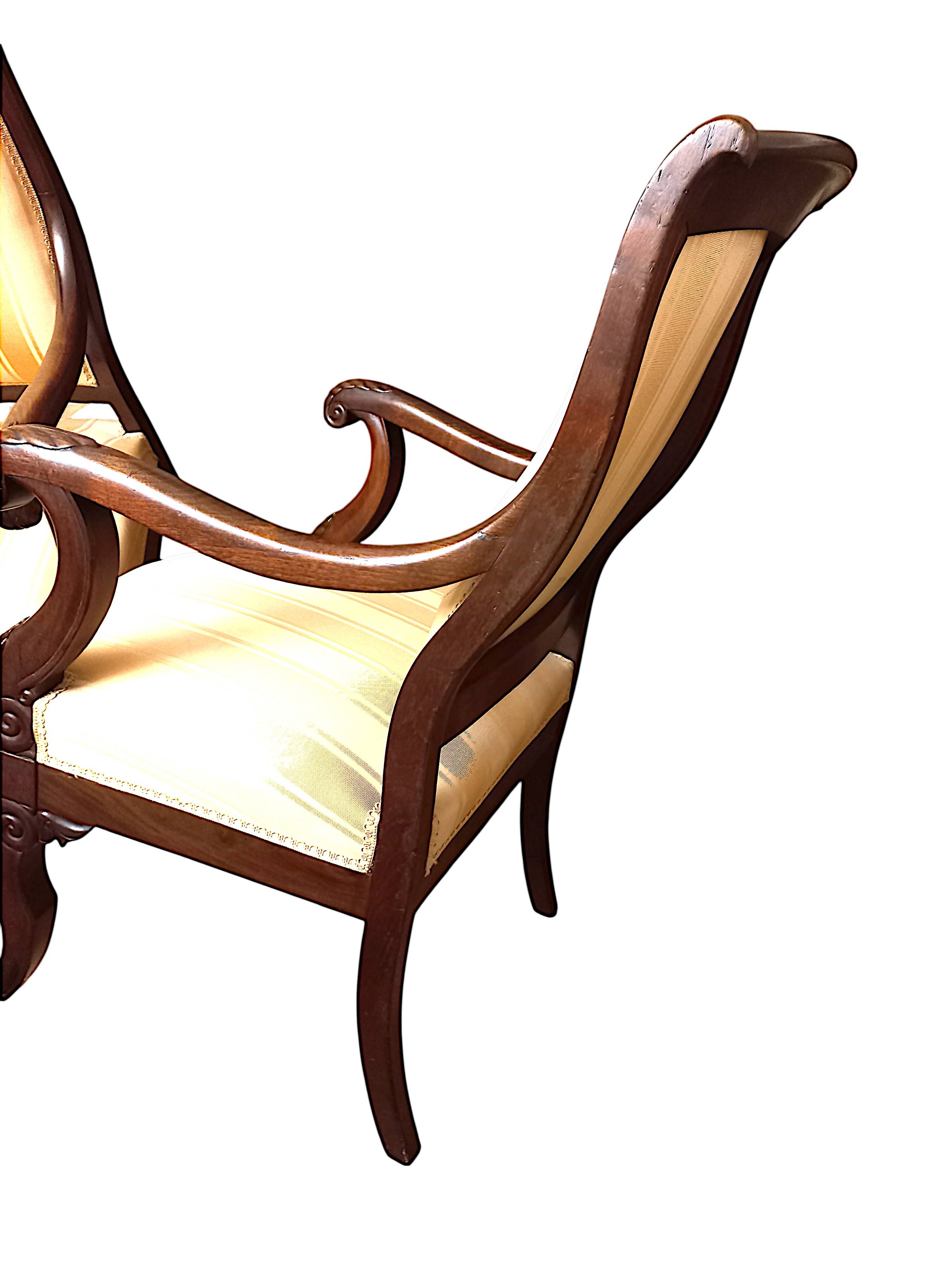 Pair of early 19th century mahogany armchairs