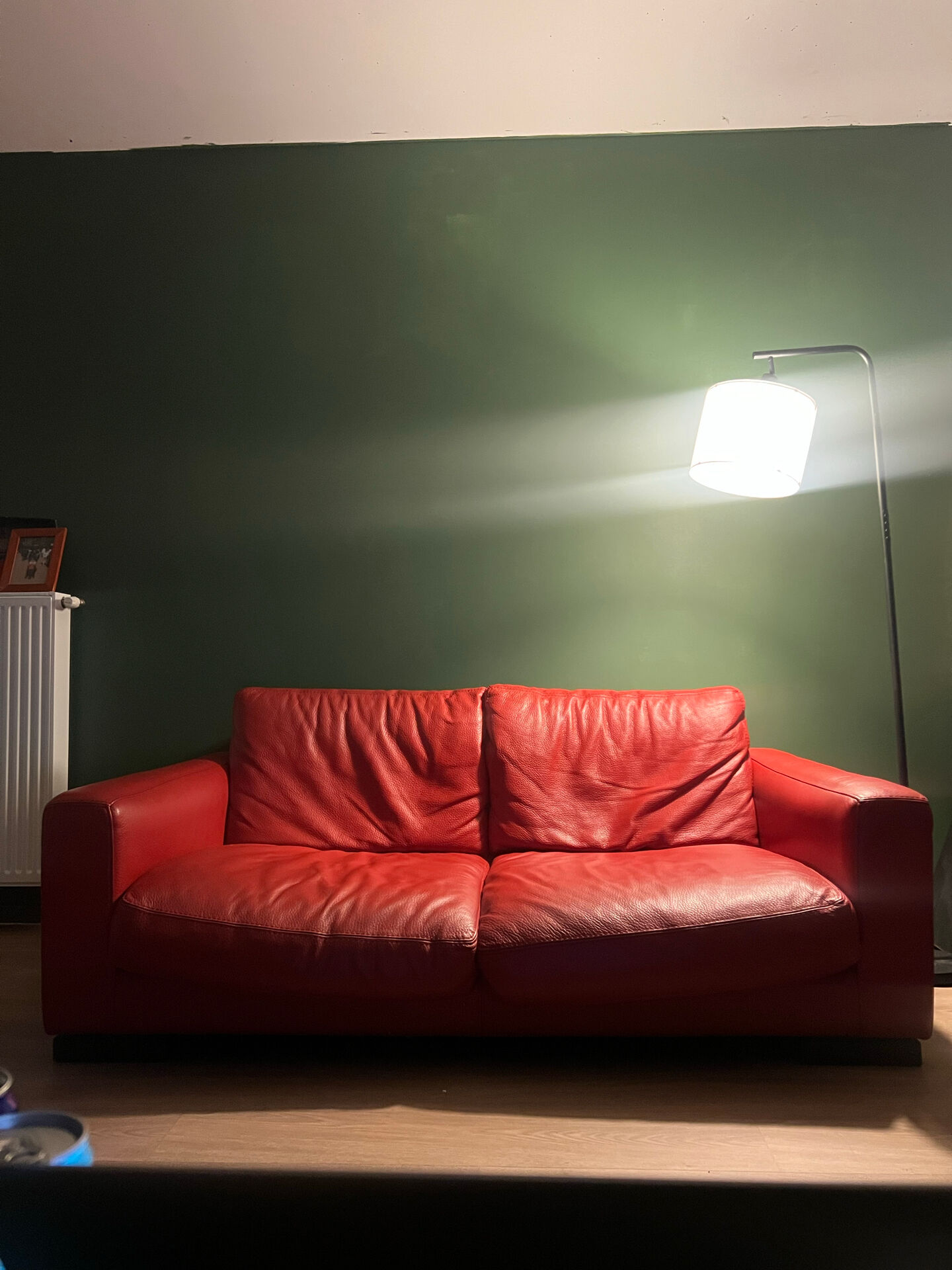 Red leather 2/3-seater sofa by Roche Bobois
