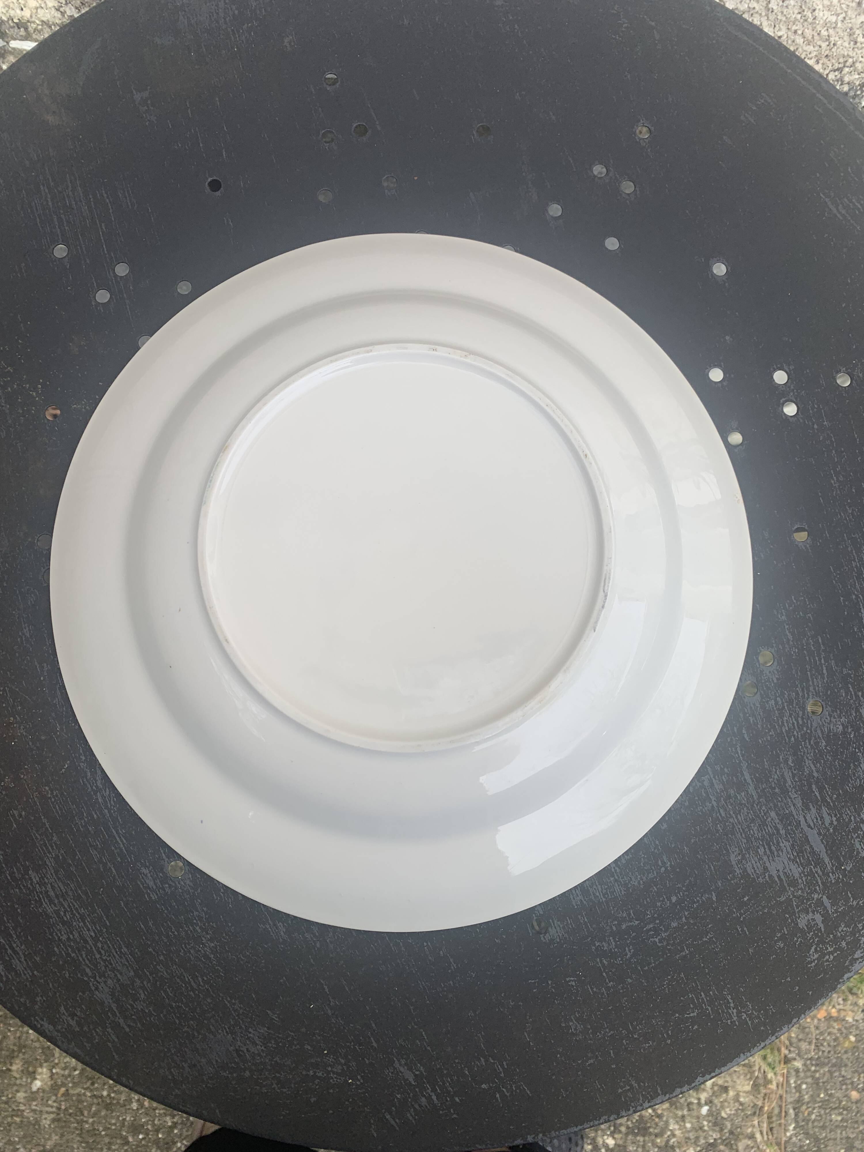 Two earthenware dishes, one hollow and one white cake dish with yellow border