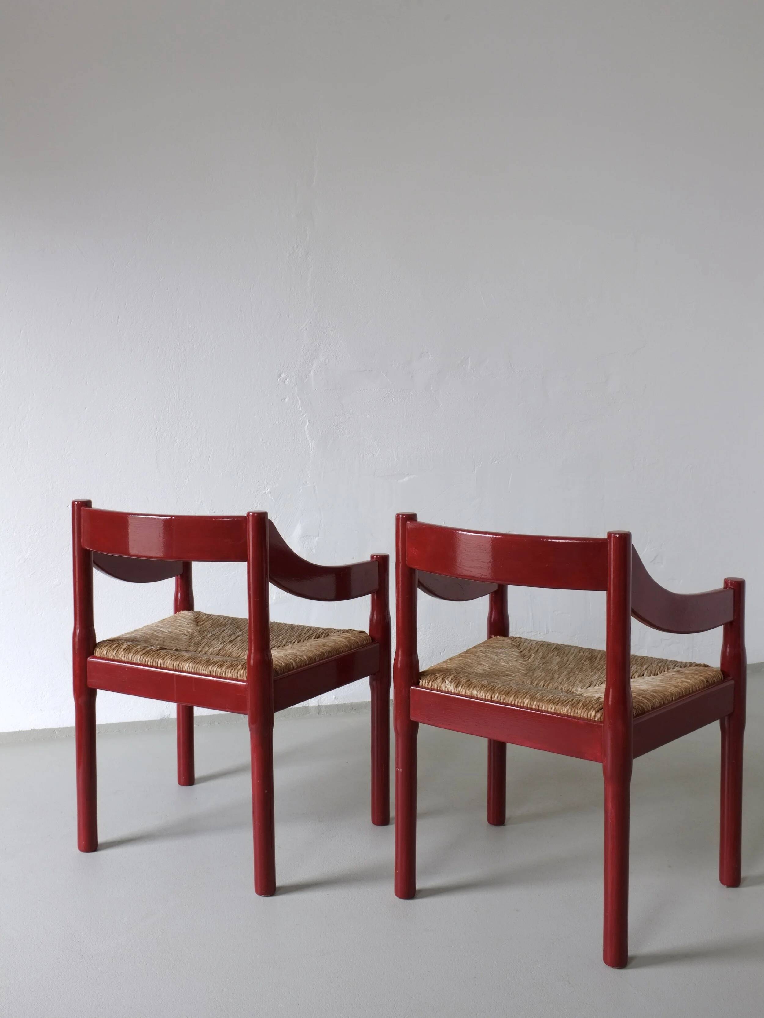 2 red Vico Magistretti “Carimate” style armchairs | Italy | 1970s