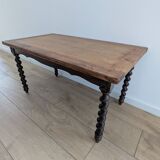 Solid wood coffee table with carved twisted legs