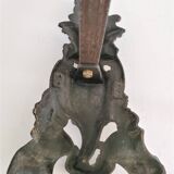 Pair of bronze andirons with black patina, 19th century, female caryatids