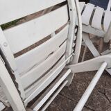 Pair of wooden garden armchairs
