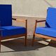 Pair of 1960s Scandinavian armchairs with blue cushions