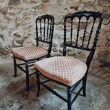Pair of antique Napoleon III chairs in blackened wood and fabric
