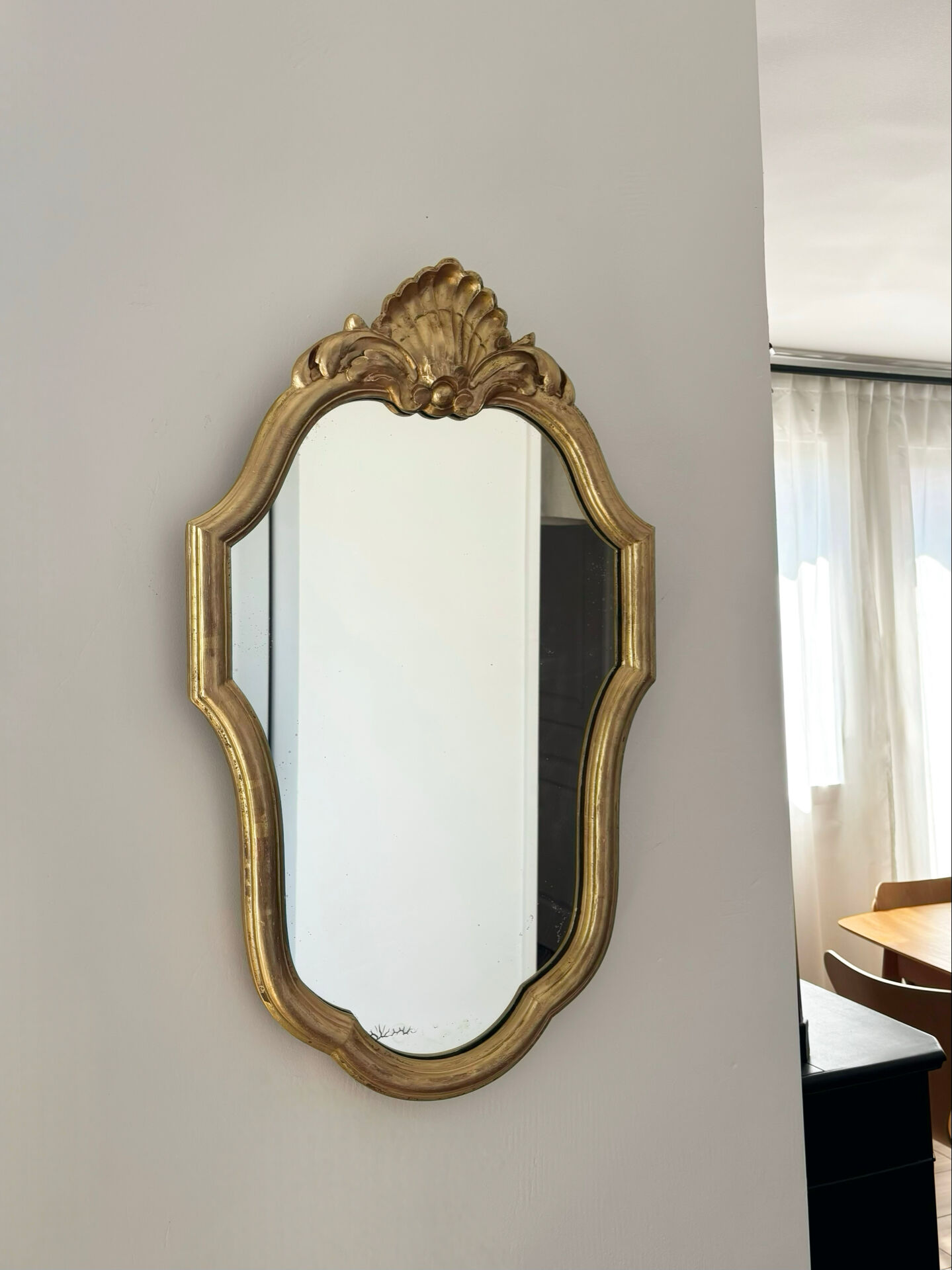 Golden baroque mirror in Louis XV style