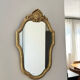 Golden baroque mirror in Louis XV style