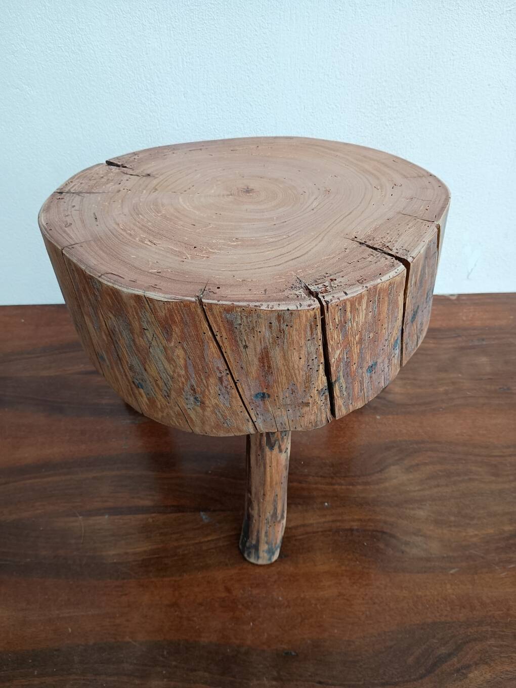 Brutalist tripod coffee table in solid wood.