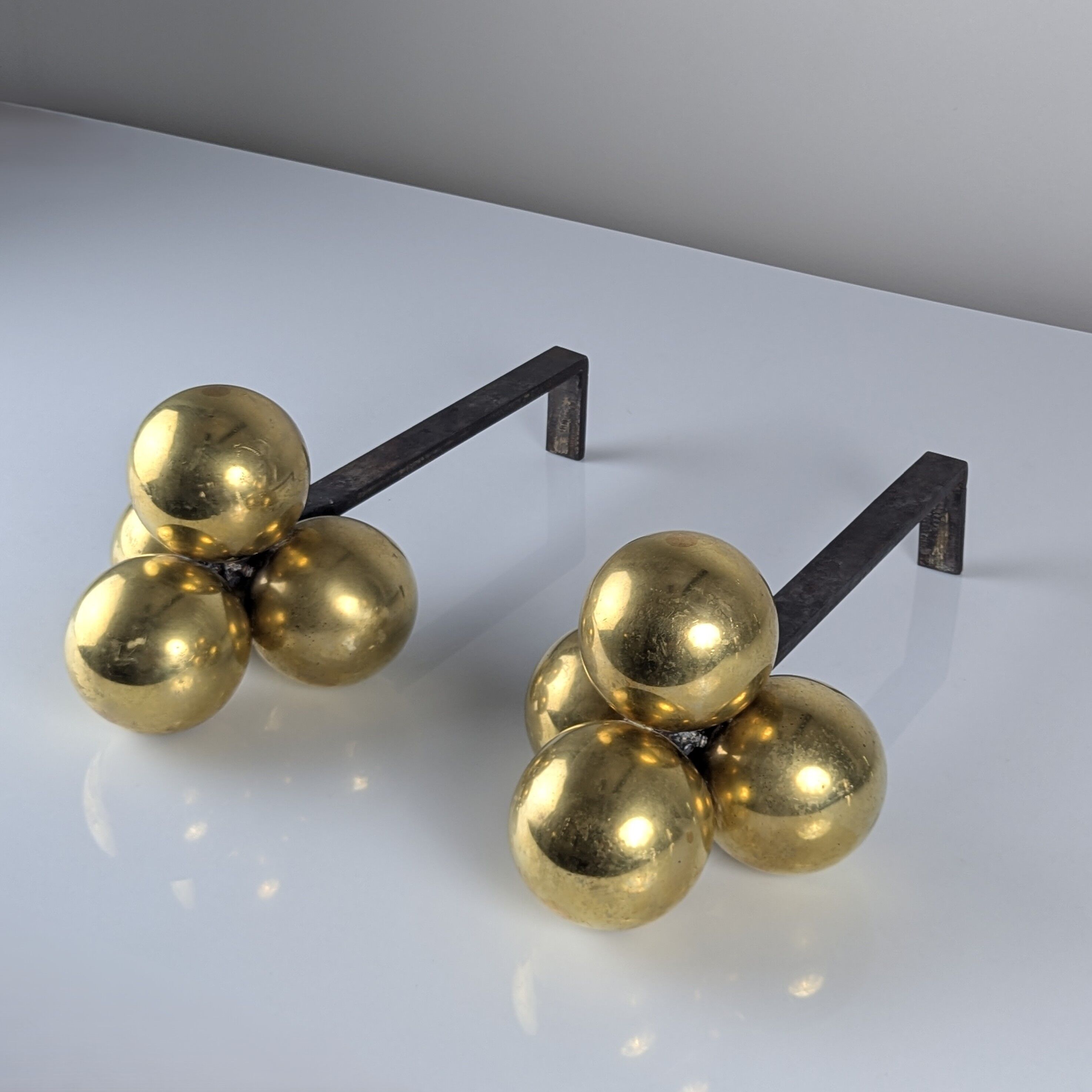 Bronze and wrought iron andirons by Jacques Adnet, 1930s