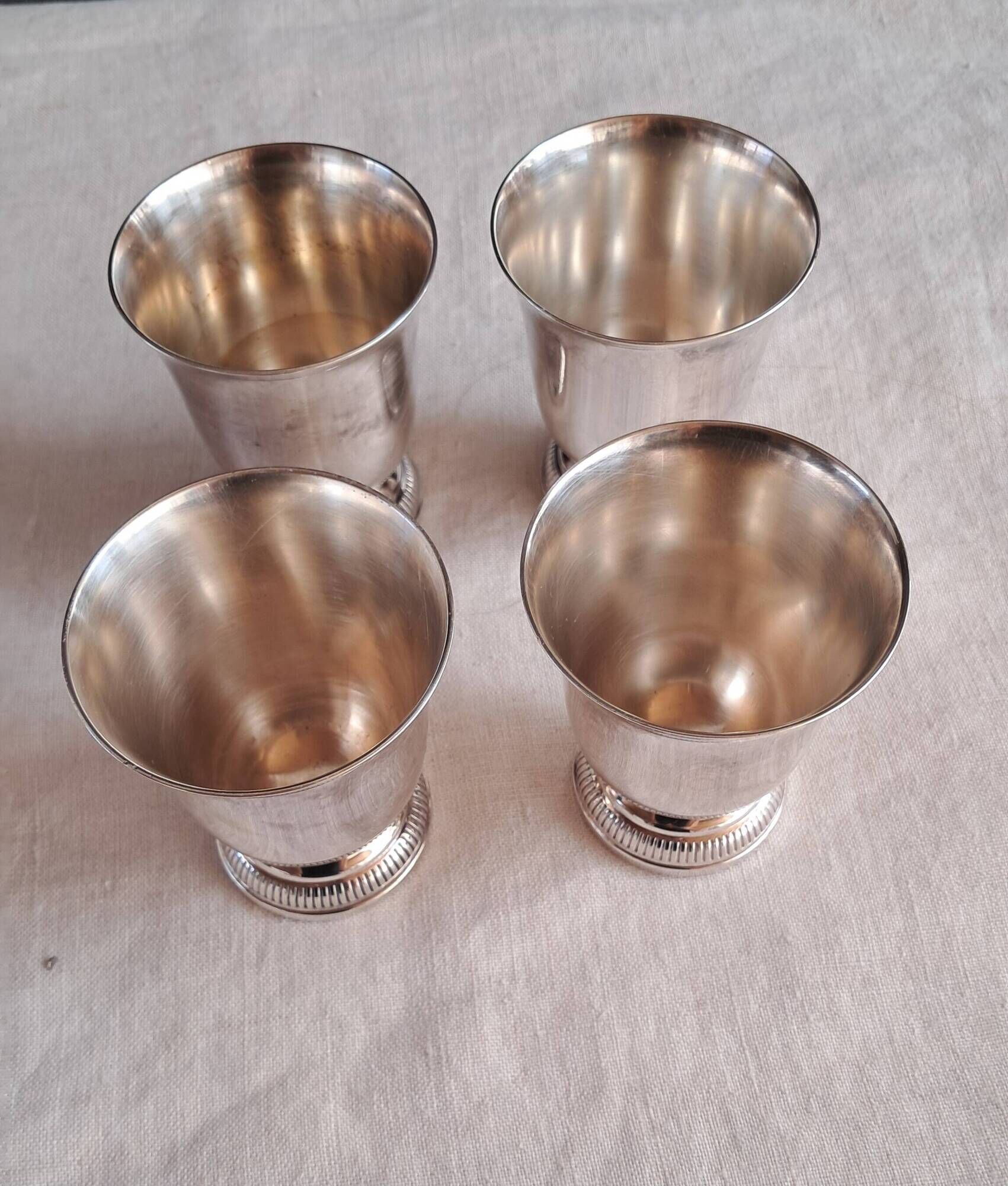 Superb set of 4 silver-plated goblets from the famous house.