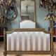 Pair of late 19th-century gilded wooden beds in Louis XVI style.