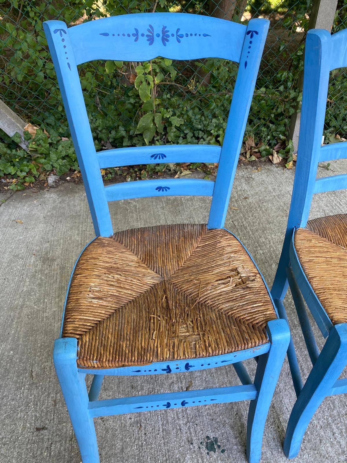 2 solid wood chairs in blue straw