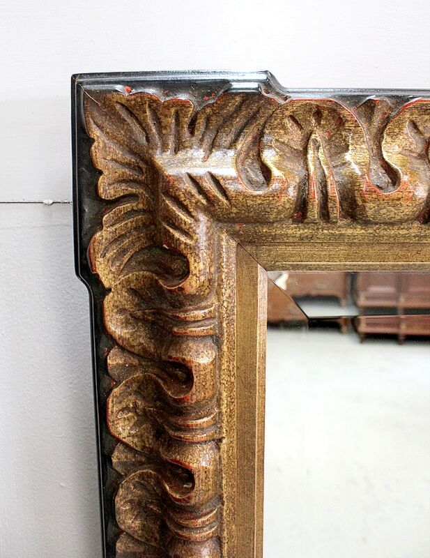 Gold-tinted wooden and stucco rectangular mirror - 1920