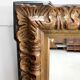 Miroir rectangulaire en bois et stuc teintés or – 1920