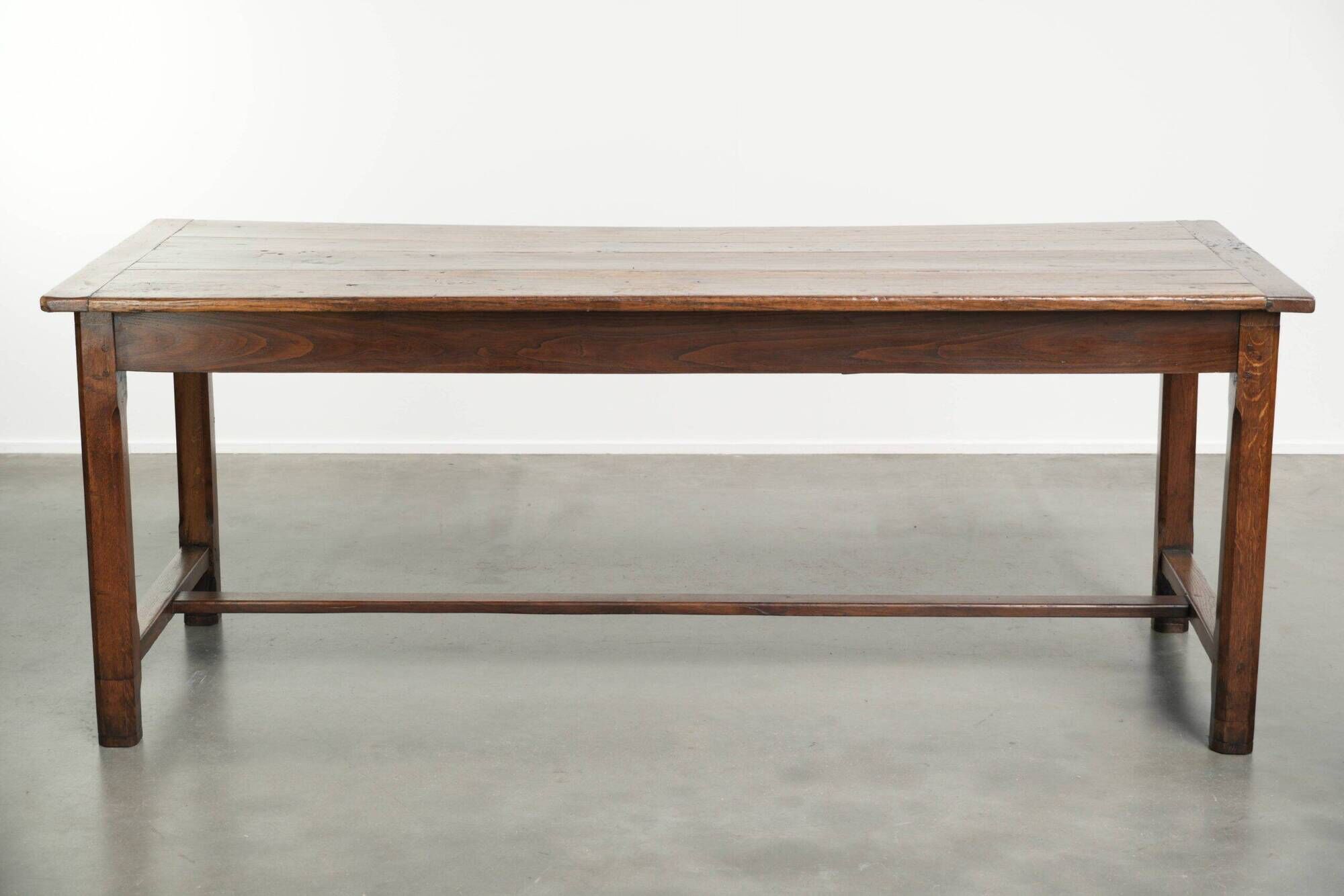 18th century French farmhouse dining table made of oak and fruitwood