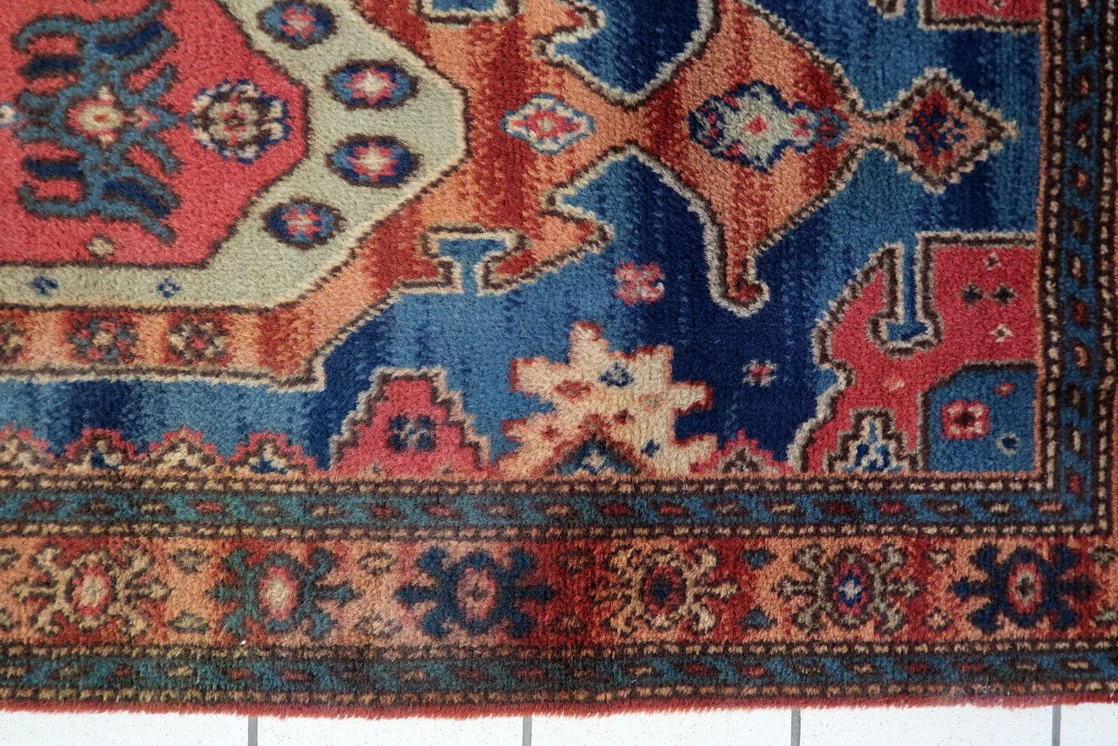 Vintage 1950s German tribal style wool rug, geometric medallion, 84cm x 180cm