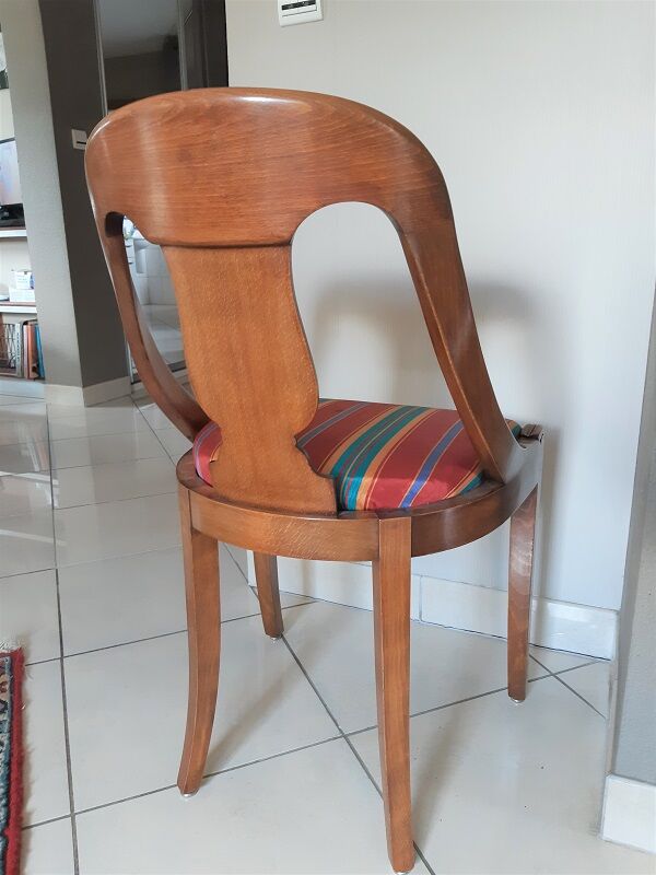 Gondola-style empire chairs