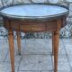 Bouillotte table in blond mahogany, Louis XVI style, 20th century period