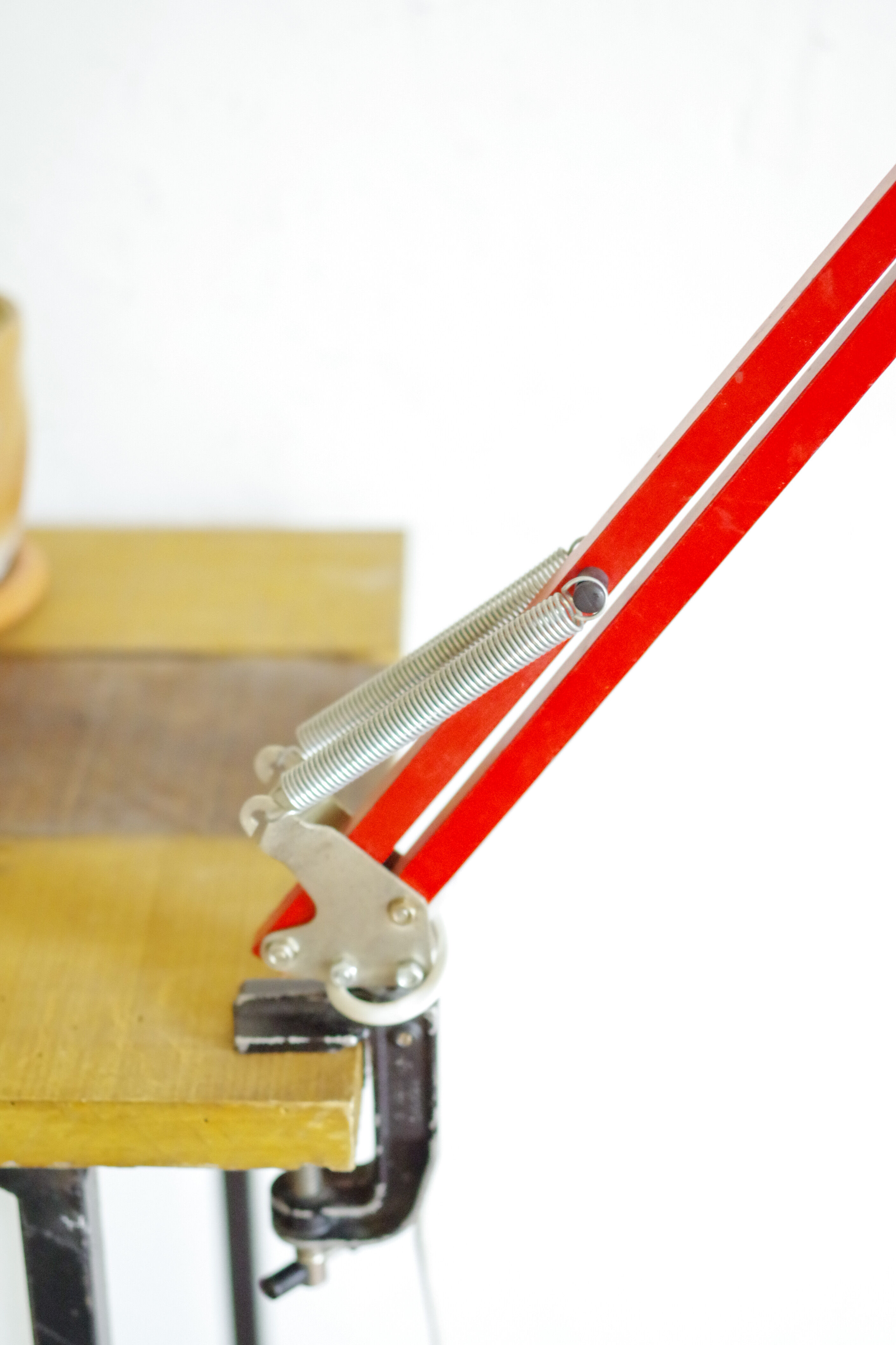 Red articulated architect lamp