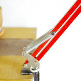Red articulated architect lamp