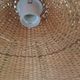 Hanging in wicker and rattan in the shape of a flower