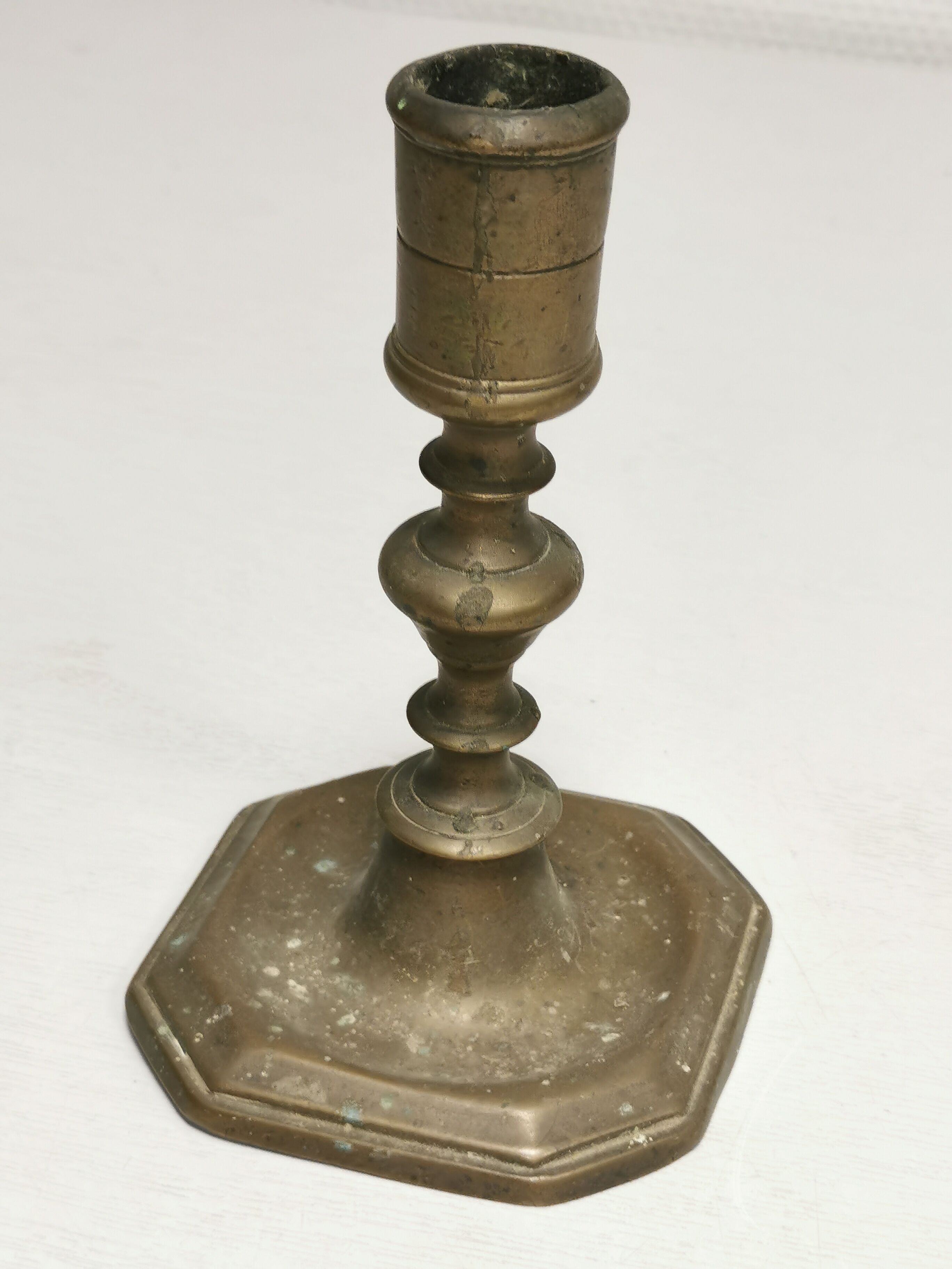 Old bronze candle holder, seventeenth century