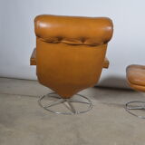 Fauteuil pivotant et son ottoman en cuir