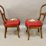Pair of Louis Philippe walnut chairs, petit point tapestry