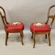 Pair of Louis Philippe walnut chairs, petit point tapestry