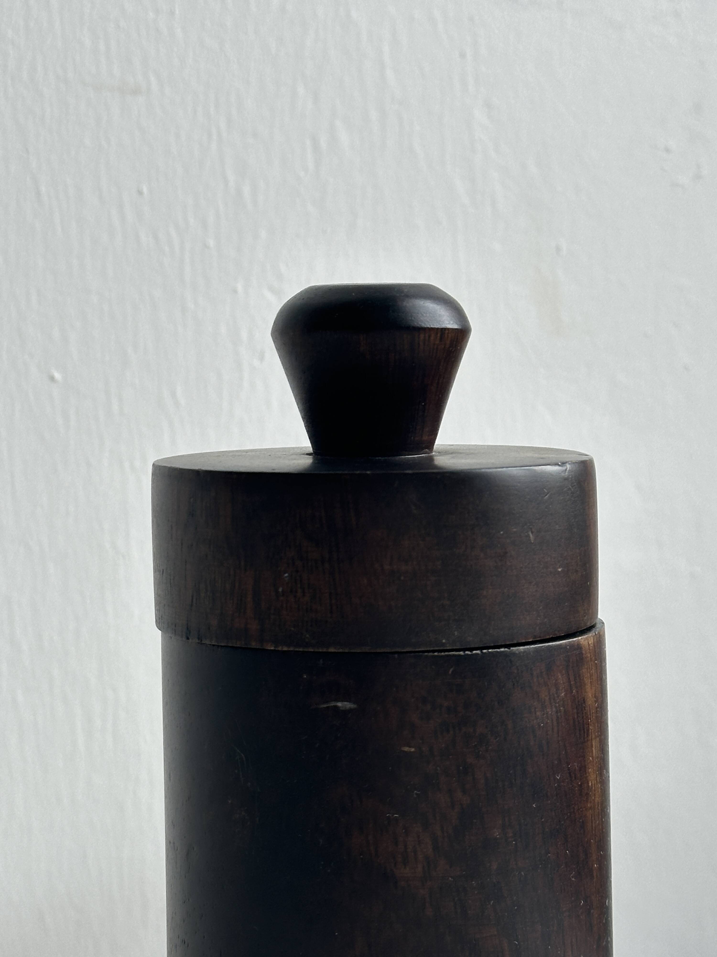 Old brutalist style wooden pot.