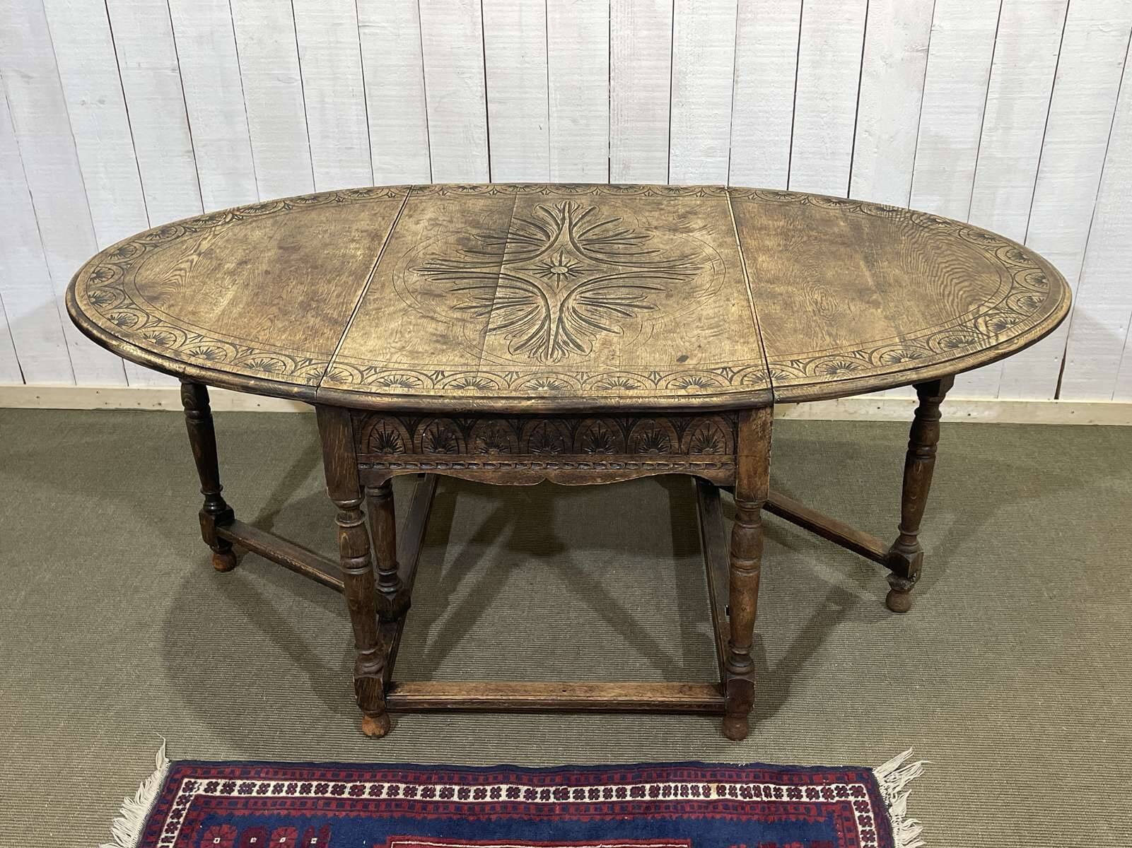 English oak drop-leaf table from the early 20th century