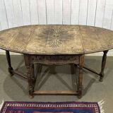 English oak drop-leaf table from the early 20th century