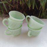 Set of green opaline cups