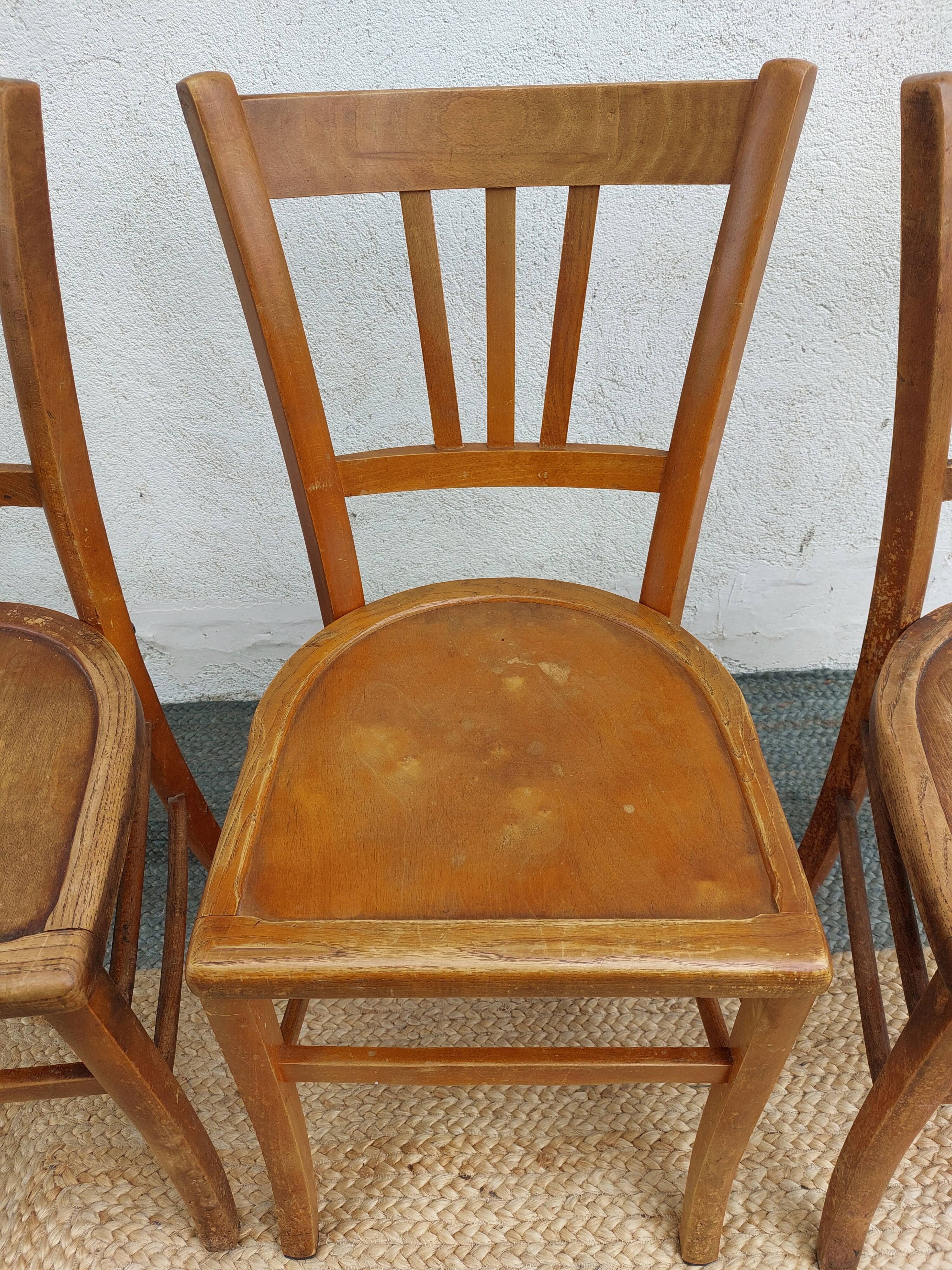 3 wooden bistro chairs