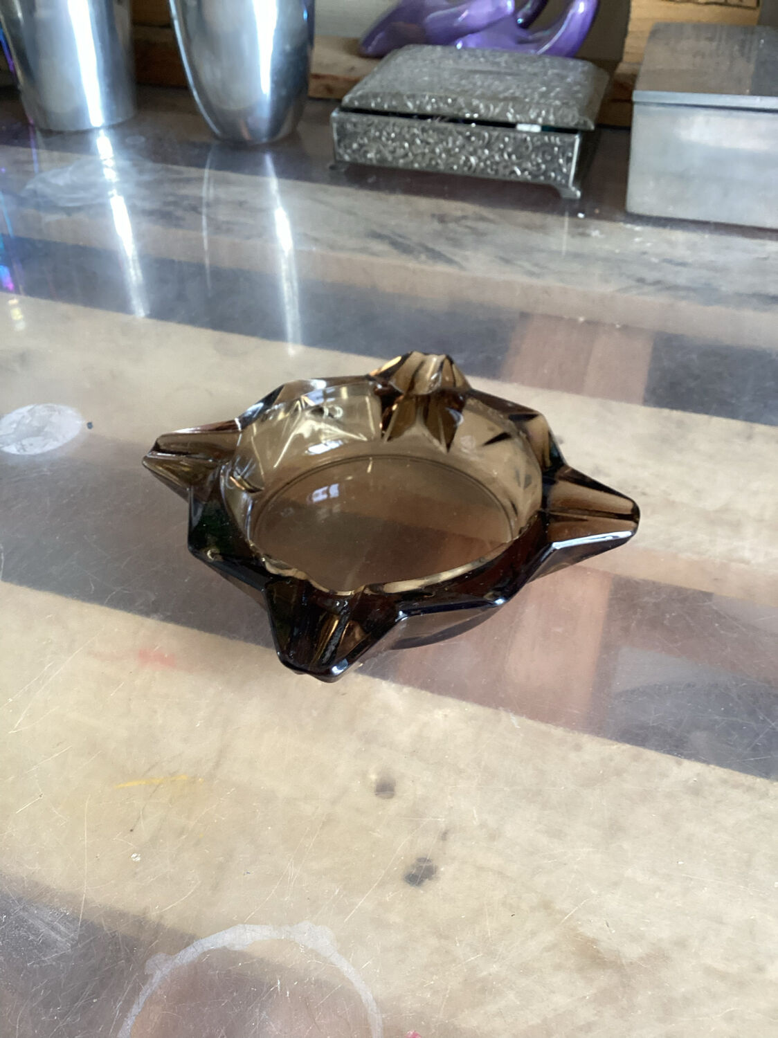 Empty ashtray vintage smoked glass pocket