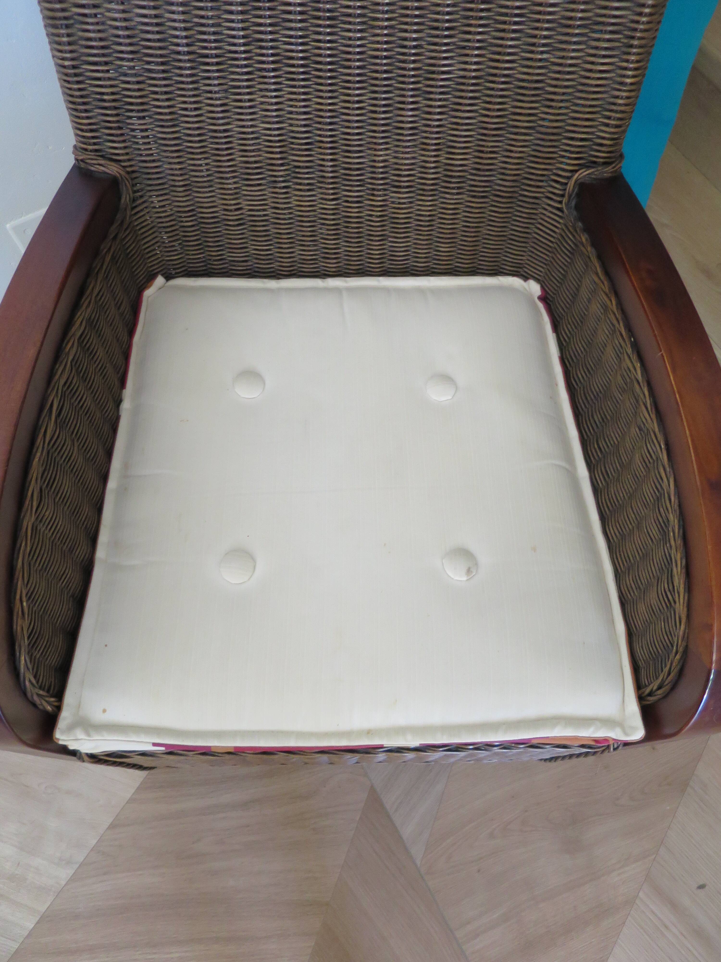 2 armchairs in woven rattan and wood, 1980s