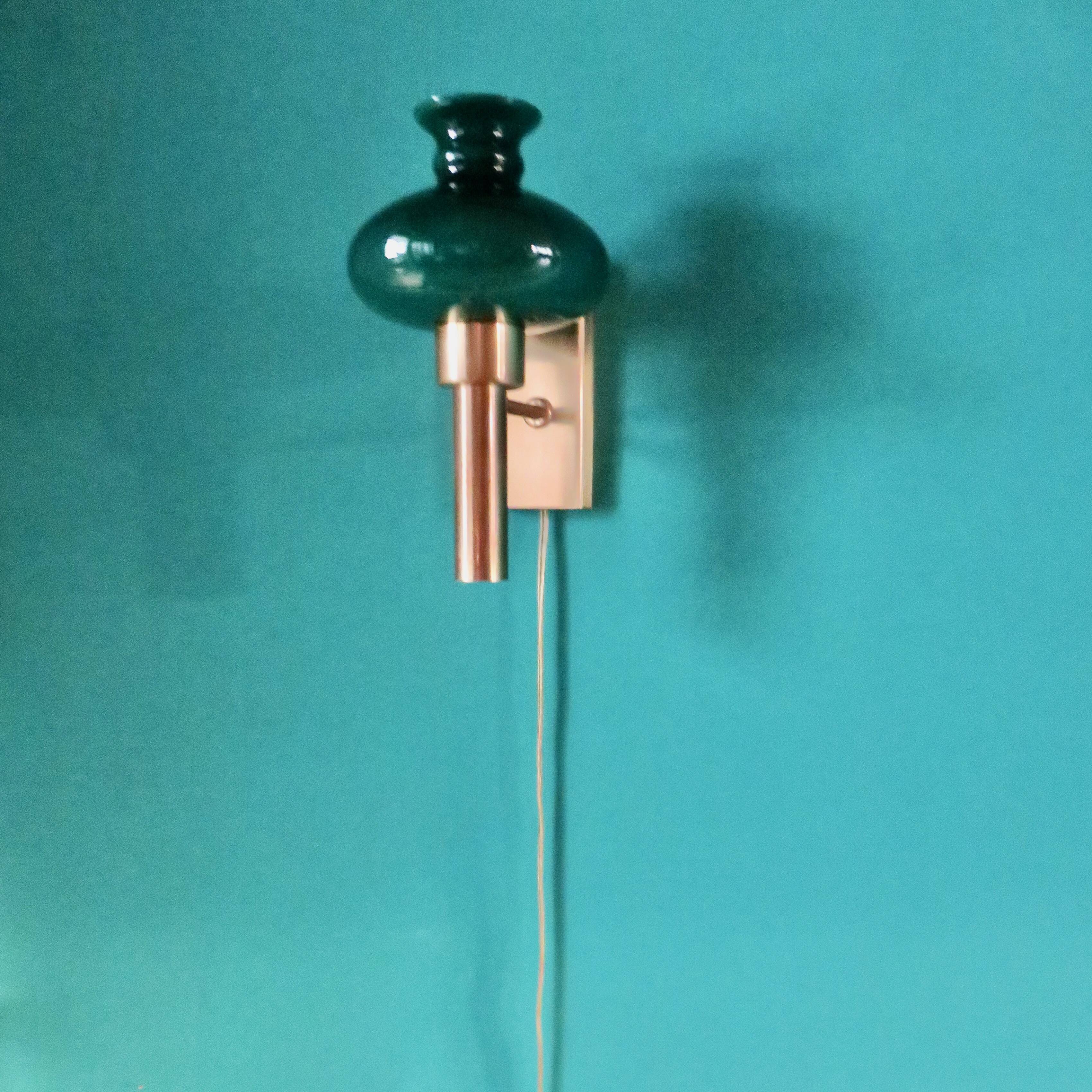Brushed brass wall light with green glass shade "Vitrika". Denmark 1980