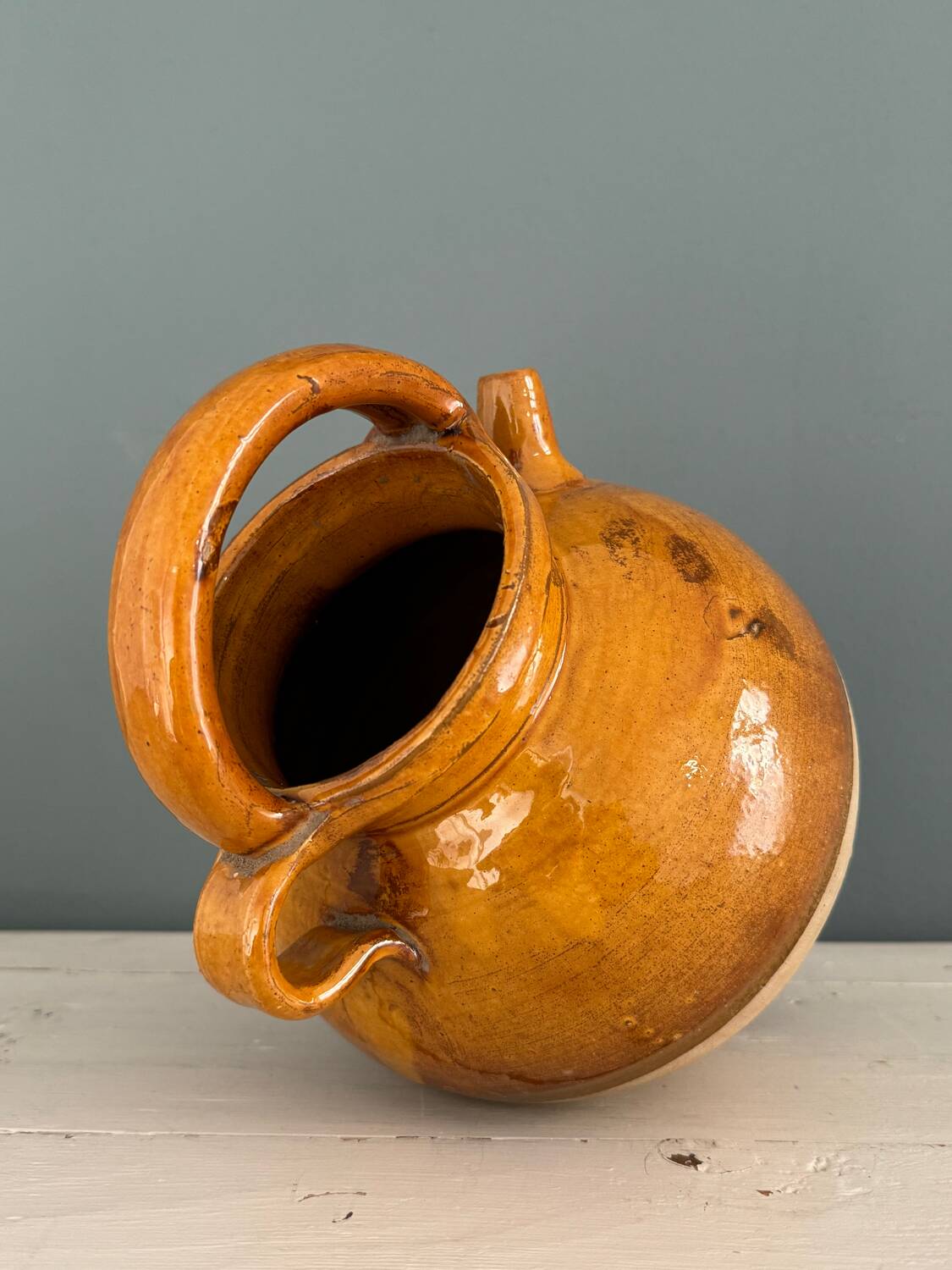 Old terracotta gargoulette jug