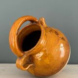 Old terracotta gargoulette jug