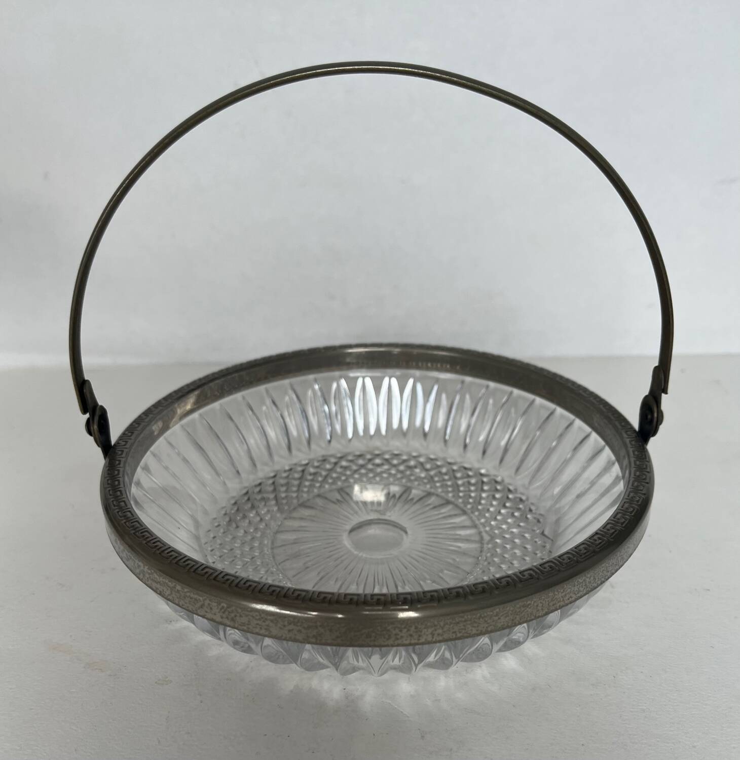 Antique glass cup with metal frame
